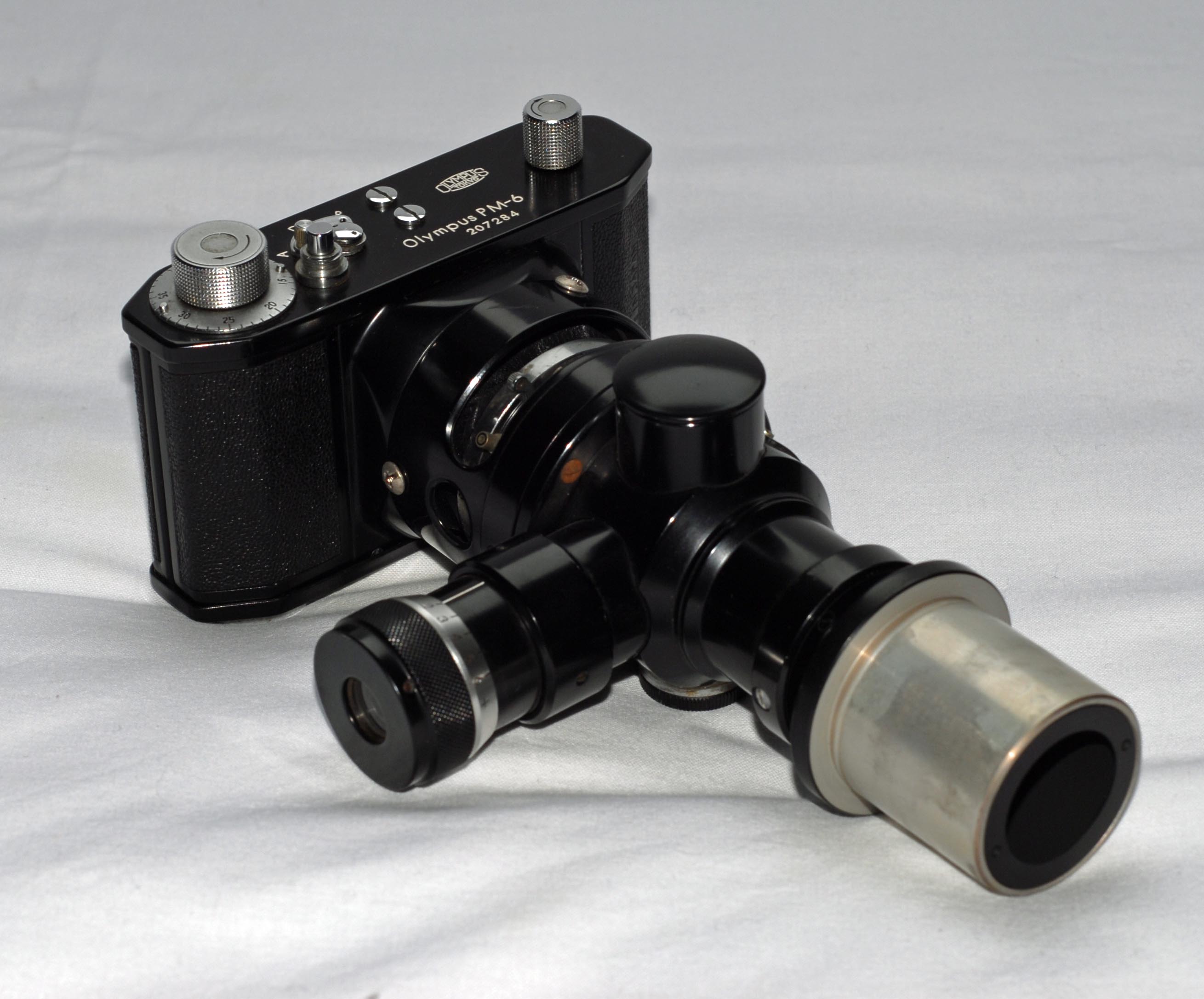 OLYMPUS PM 6
